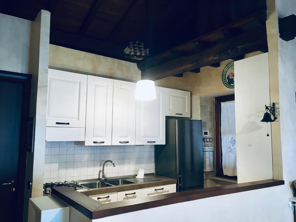Kuchyň nebo kuchyňský kout v ubytování Locanda dell'Arcangelo