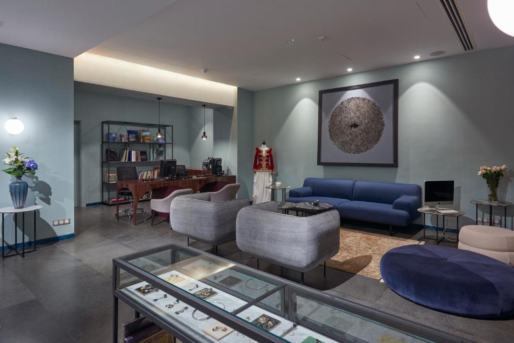 Posezení v ubytování M Suite Hotel