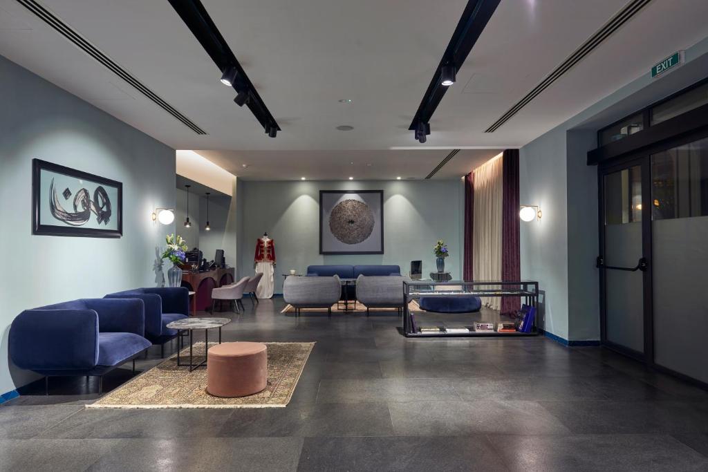 Posezení v ubytování M Suite Hotel