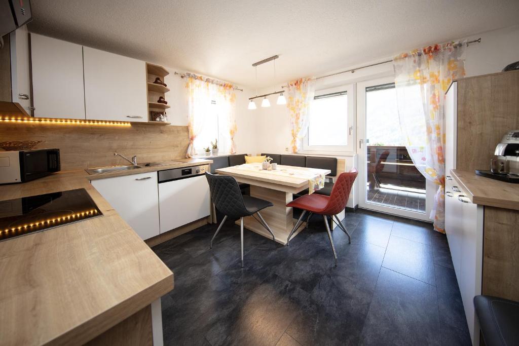 Kuchyňa alebo kuchynka v ubytovaní Appartement Harmonie