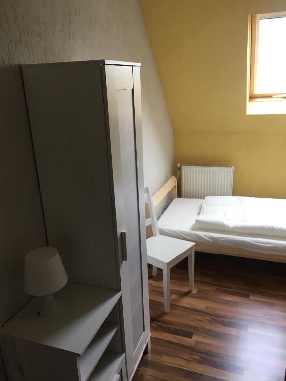 Postel nebo postele na pokoji v ubytování Haus Nova am Bollerberg