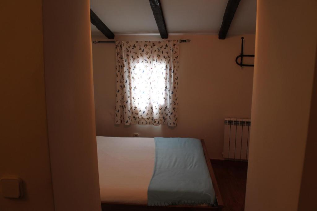 Postel nebo postele na pokoji v ubytování Old Navy House