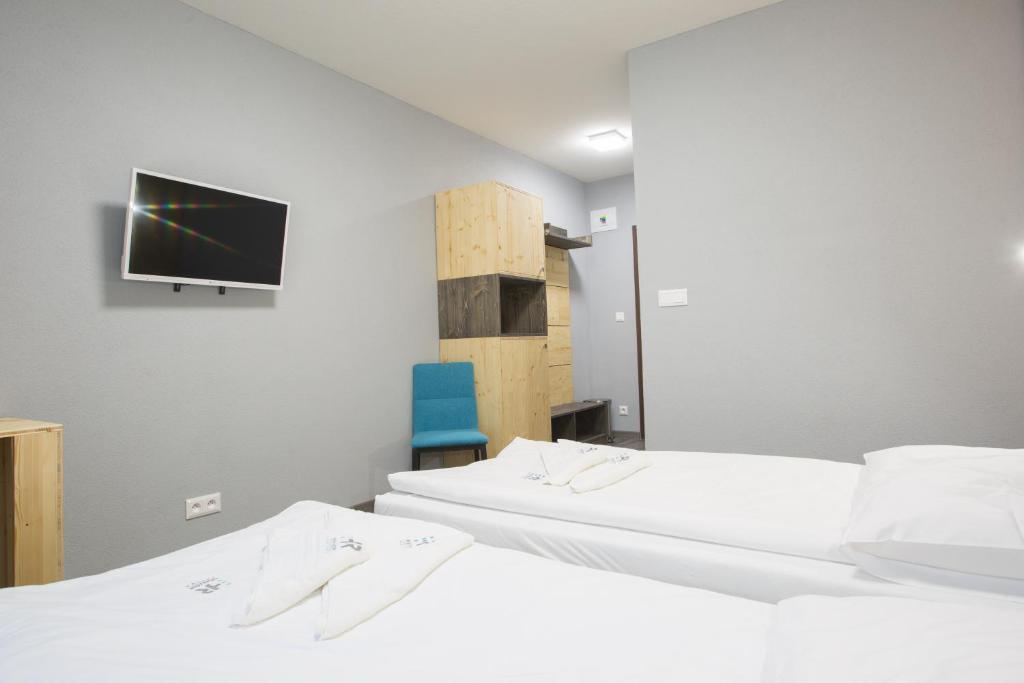 Letto o letti in una camera di Penzión Squash