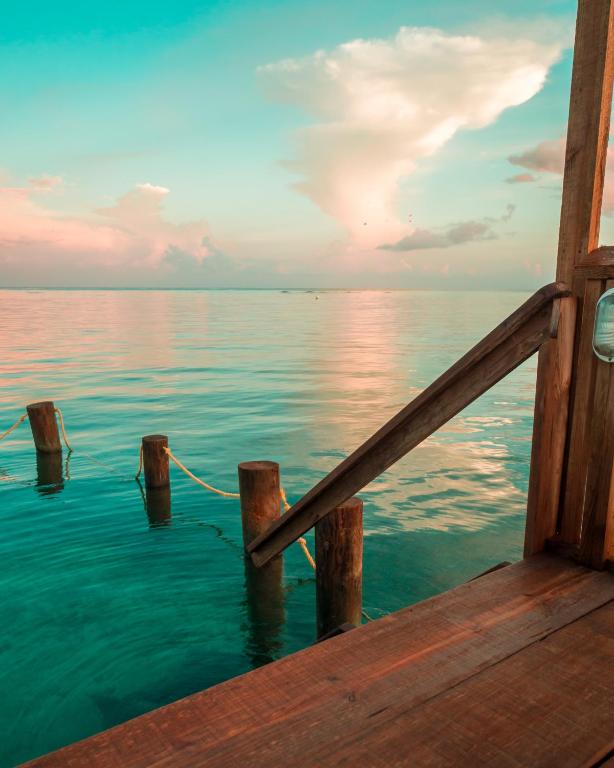 a view of the ocean from a dock at Splash Inn Dive Resort & Villas in West End