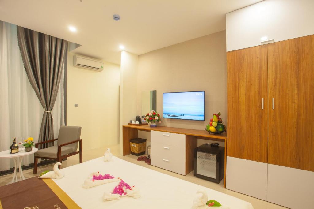 TV/trung tâm giải trí tại Ecstasy Hotel