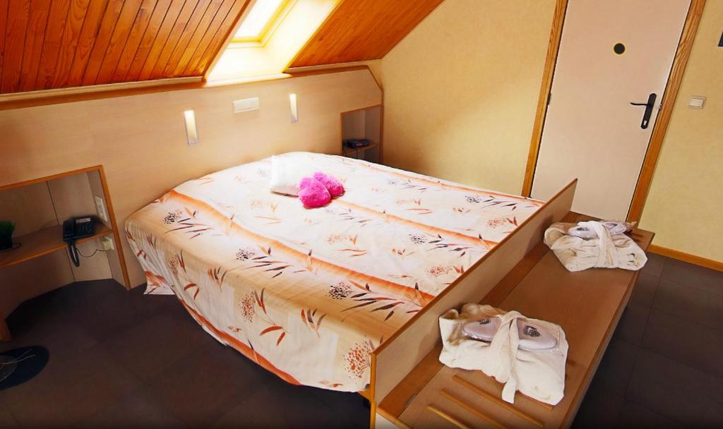 Postel nebo postele na pokoji v ubytování Familiehotel Soll Cress Koksijde