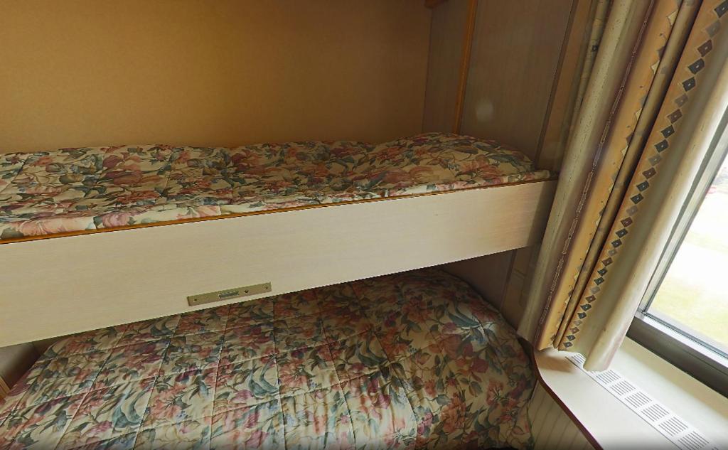 Postel nebo postele na pokoji v ubytování Familiehotel Soll Cress Koksijde