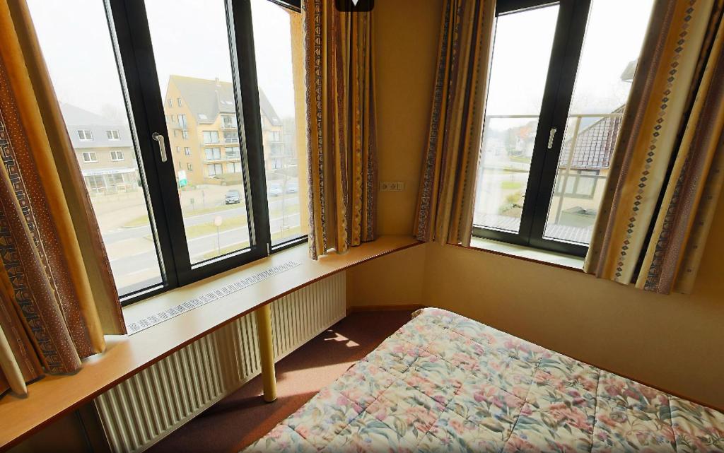 Postel nebo postele na pokoji v ubytování Familiehotel Soll Cress Koksijde