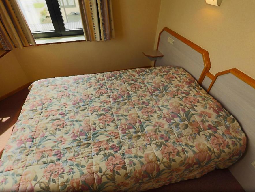 Postel nebo postele na pokoji v ubytování Familiehotel Soll Cress Koksijde