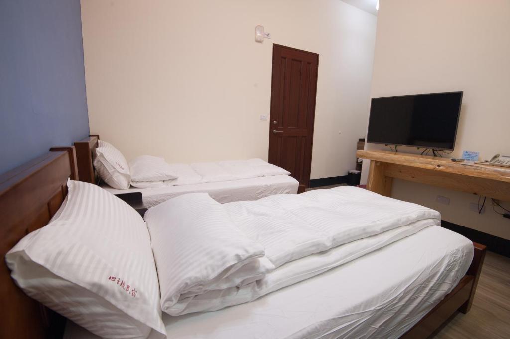 Postel nebo postele na pokoji v ubytování Habitat Heart B&B