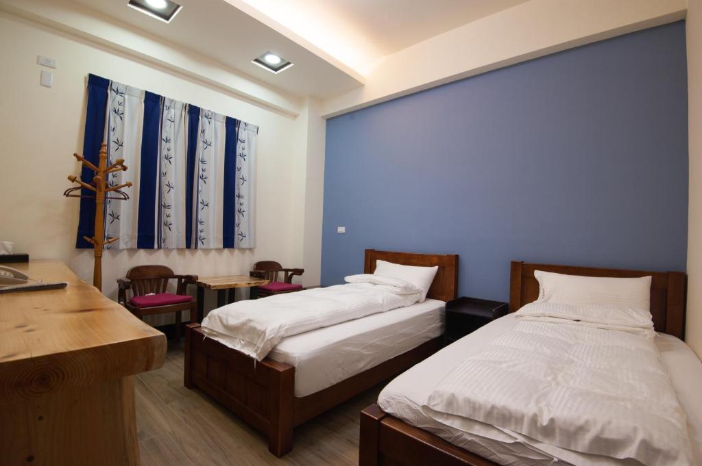 Postel nebo postele na pokoji v ubytování Habitat Heart B&B