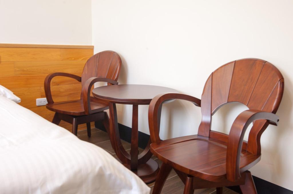 Postel nebo postele na pokoji v ubytování Habitat Heart B&B