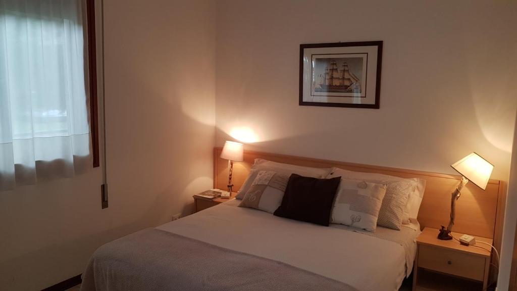 Postel nebo postele na pokoji v ubytování Villa Gardenia