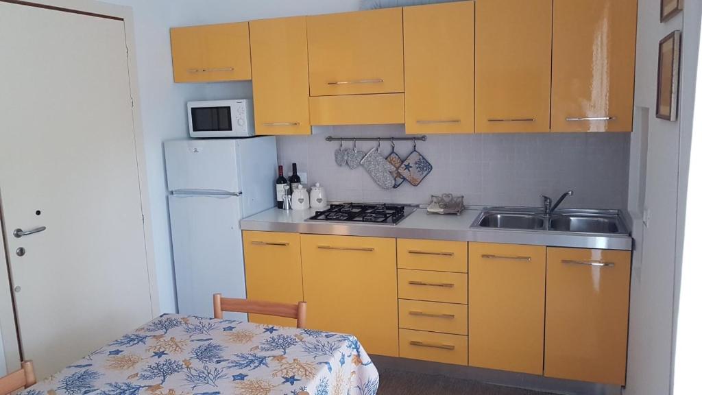 Kuchyň nebo kuchyňský kout v ubytování Villa Gardenia
