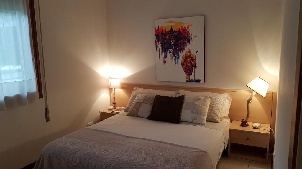 Postel nebo postele na pokoji v ubytování Villa Gardenia