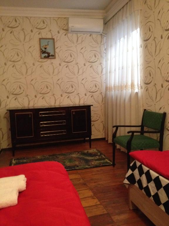 Postel nebo postele na pokoji v ubytování Nika7
