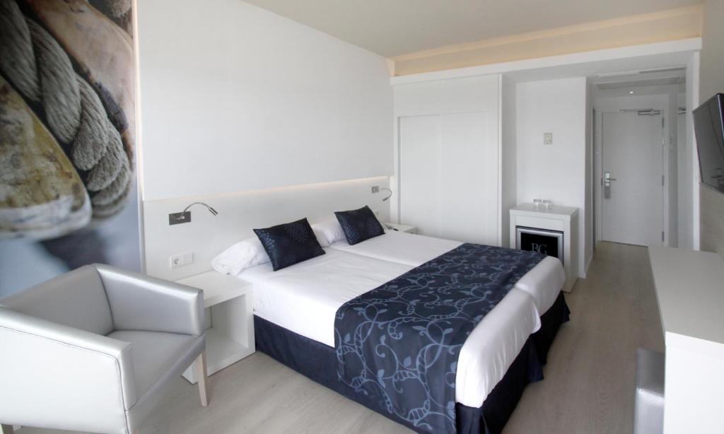 A bed or beds in a room at BG Java