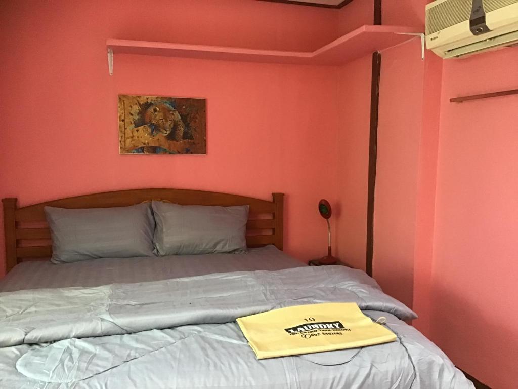 Postel nebo postele na pokoji v ubytování Grand Tree