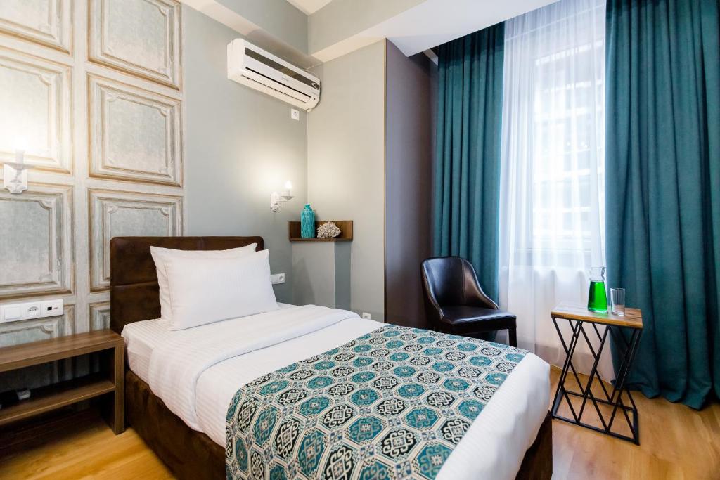 Postel nebo postele na pokoji v ubytování Hotel Diamond