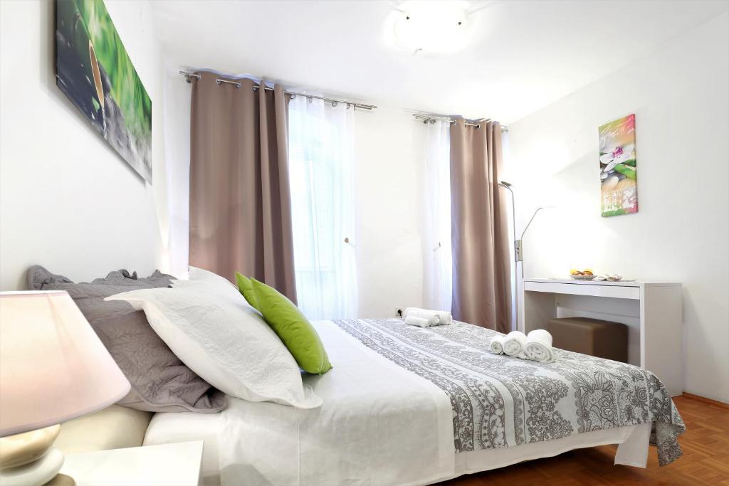 Postel nebo postele na pokoji v ubytování Apartment Meri