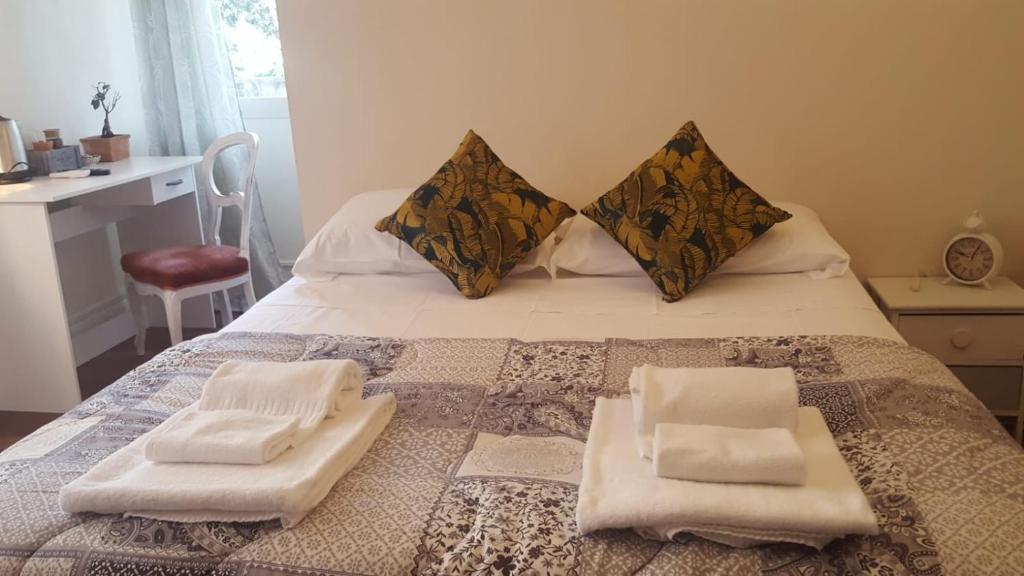 Posteľ alebo postele v izbe v ubytovaní Dreaming Piazza Bra Rooms