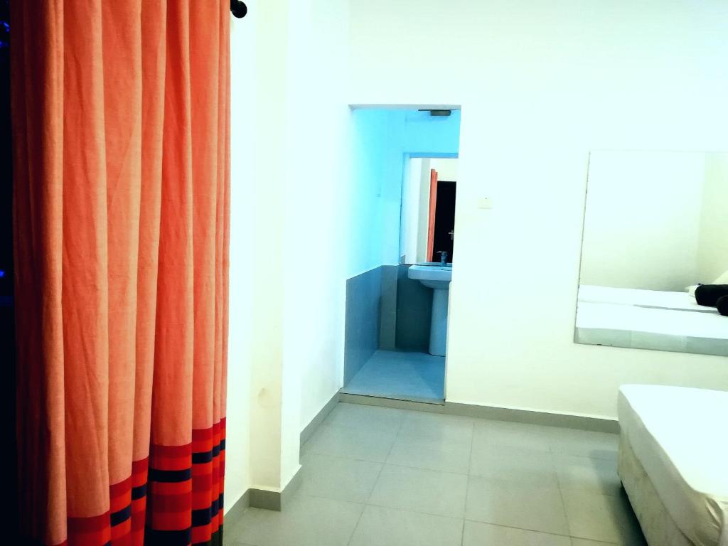 Postel nebo postele na pokoji v ubytování Lavendra Villa Mirissa