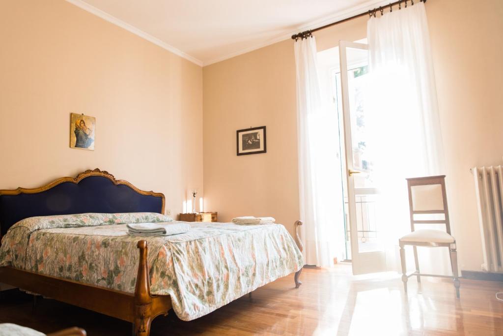 Posteľ alebo postele v izbe v ubytovaní Casa Rinaldi