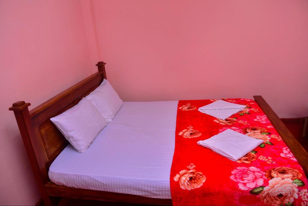 Postel nebo postele na pokoji v ubytování Lak Sewana Home Stay