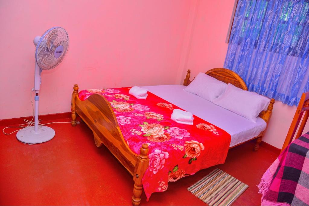 Postel nebo postele na pokoji v ubytování Lak Sewana Home Stay