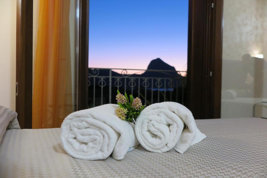 Łóżko lub łóżka w pokoju w obiekcie Trigrana Vacanze Hotel