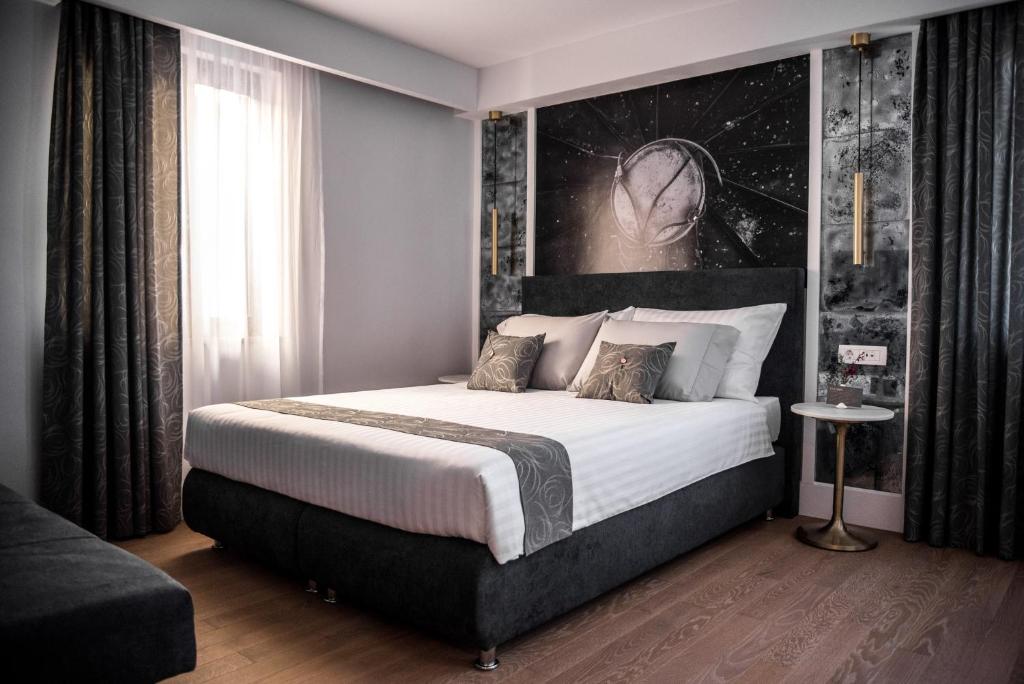 Postel nebo postele na pokoji v ubytování La Loggia