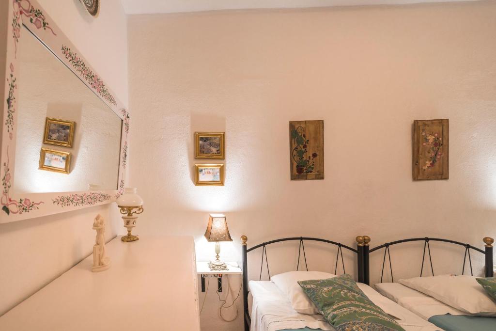 Postel nebo postele na pokoji v ubytování Kristina´s rooms