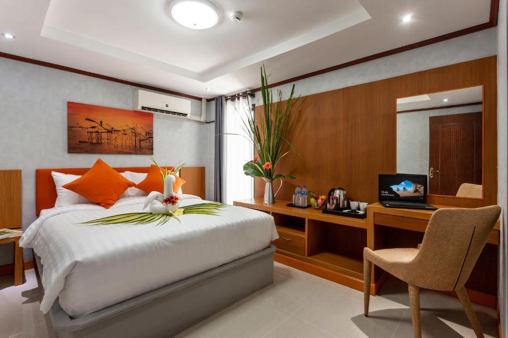 Llit o llits en una habitació de The Iconic Hotel Suvarnbhumi Airport