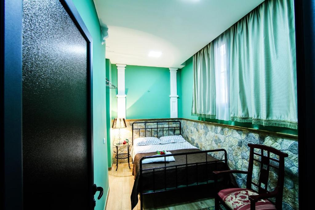 Postel nebo postele na pokoji v ubytování MGA Hostel & Tours