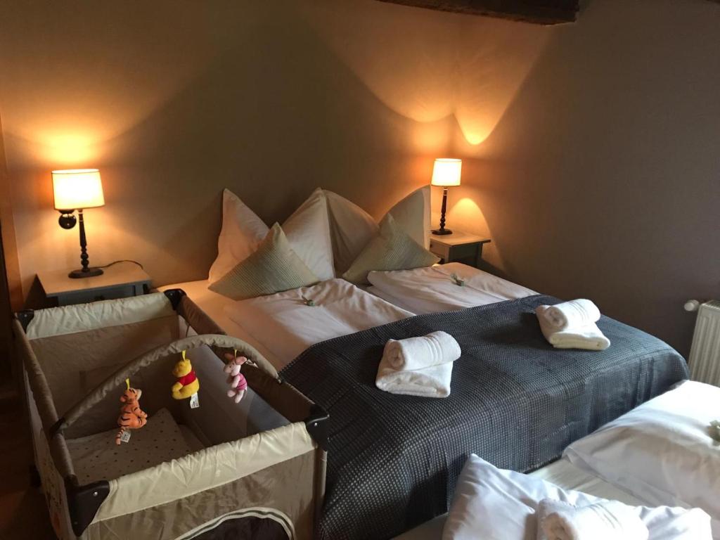 Voodi või voodid majutusasutuse Landhotel Ruhepol - garni toas