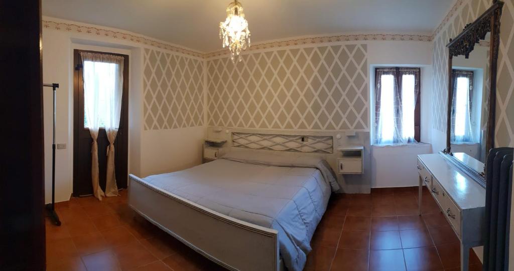 Postel nebo postele na pokoji v ubytování Casa Vecia