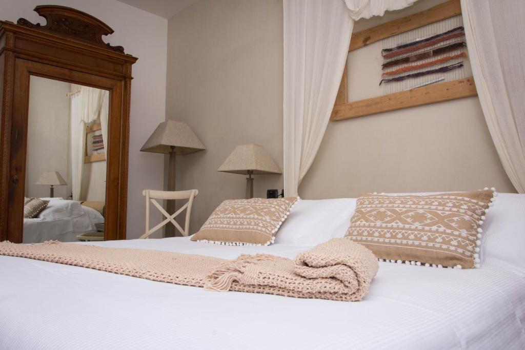 Postel nebo postele na pokoji v ubytování Hotel Borgo Pantano