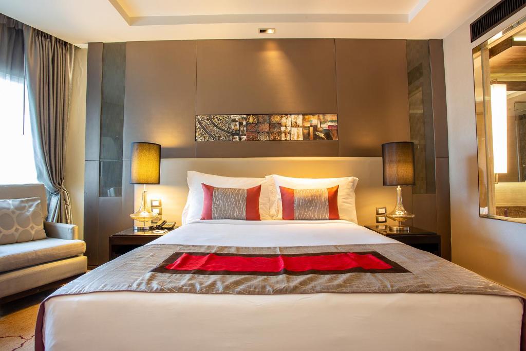 Postel nebo postele na pokoji v ubytování Graceland Bangkok by Grace Hotel - SHA Extra Plus