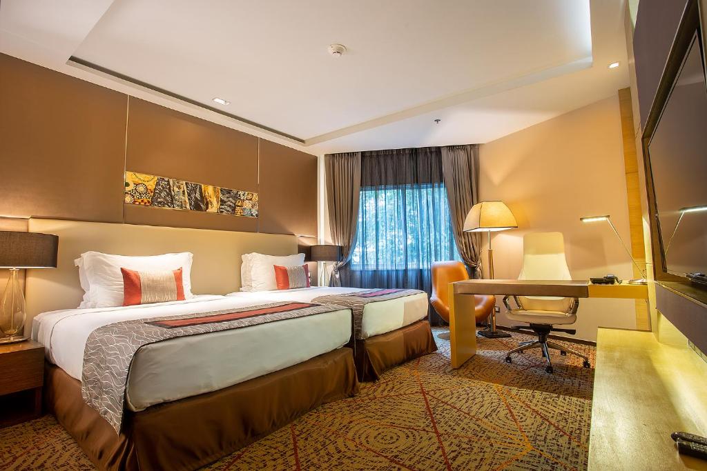Postel nebo postele na pokoji v ubytování Graceland Bangkok by Grace Hotel - SHA Extra Plus