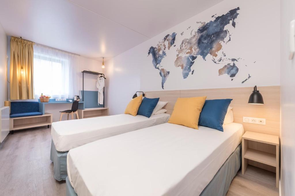 Postel nebo postele na pokoji v ubytování Tulip Inn Antwerpen