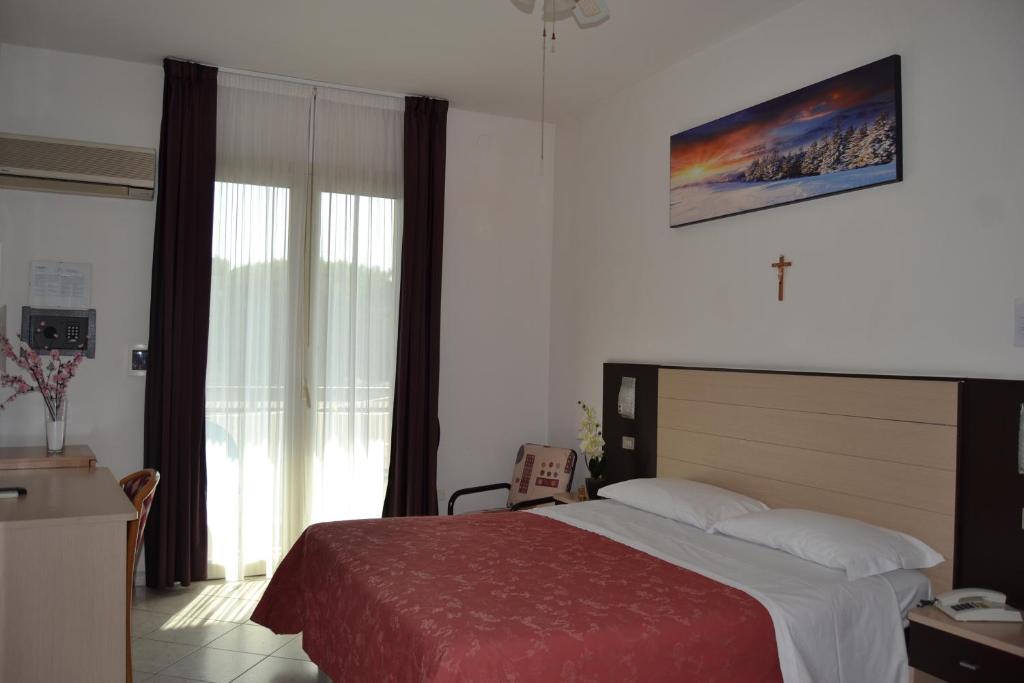 Postel nebo postele na pokoji v ubytování Hotel Zenith