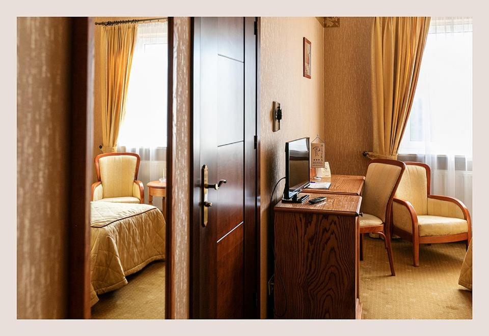 Postel nebo postele na pokoji v ubytování Hotel Mistral
