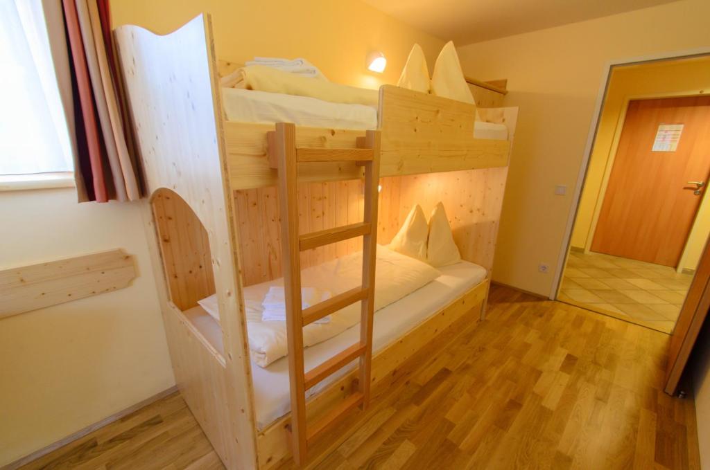 Postel nebo postele na pokoji v ubytování JUFA Hotel Donnersbachwald