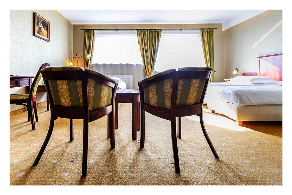 Postel nebo postele na pokoji v ubytování Hotel Mistral