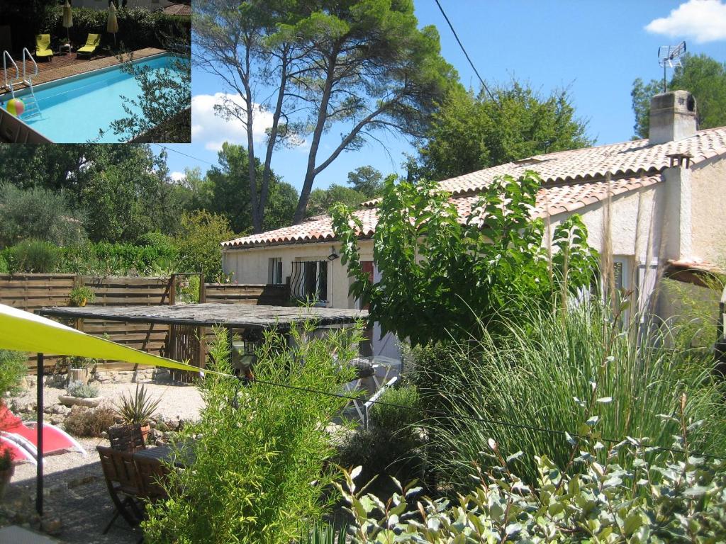 a house with a swimming pool and a garden at la souquette in Draguignan