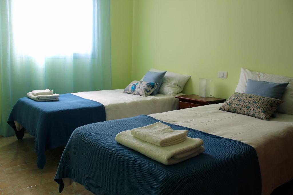 Кровать или кровати в номере Blue Views