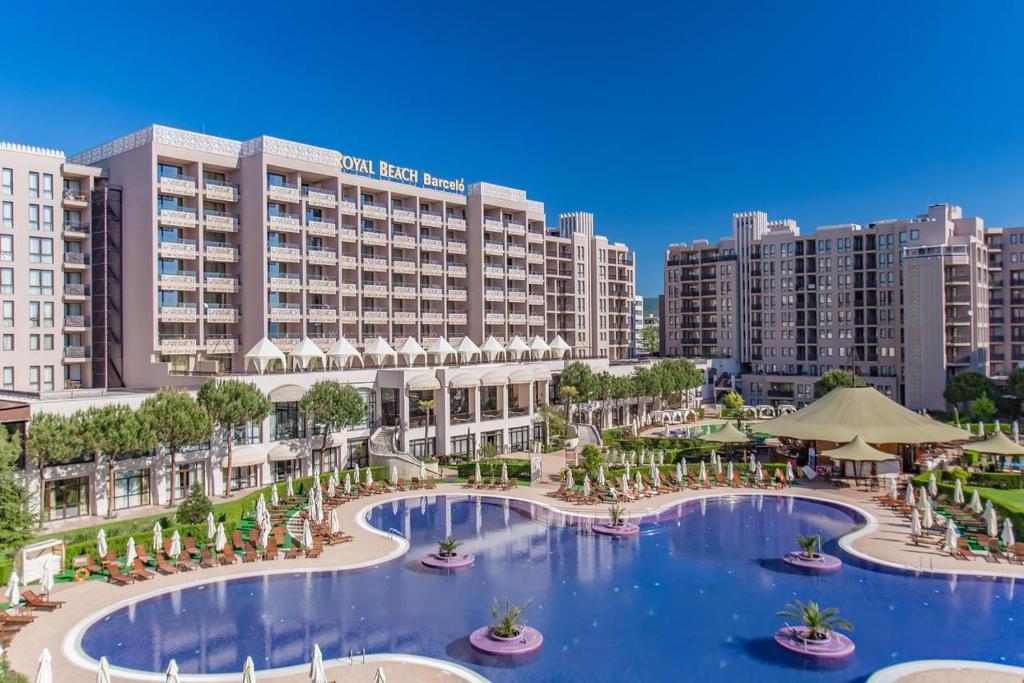 a view of a resort with a large swimming pool at Royal Beach Premium in Sunny Beach