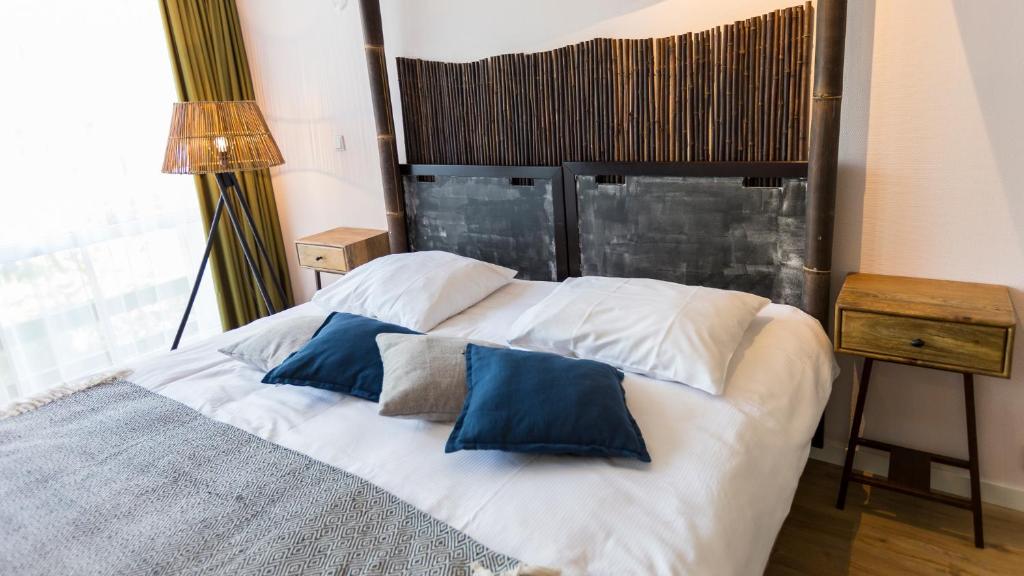 Postel nebo postele na pokoji v ubytování Hotel Spelderholt