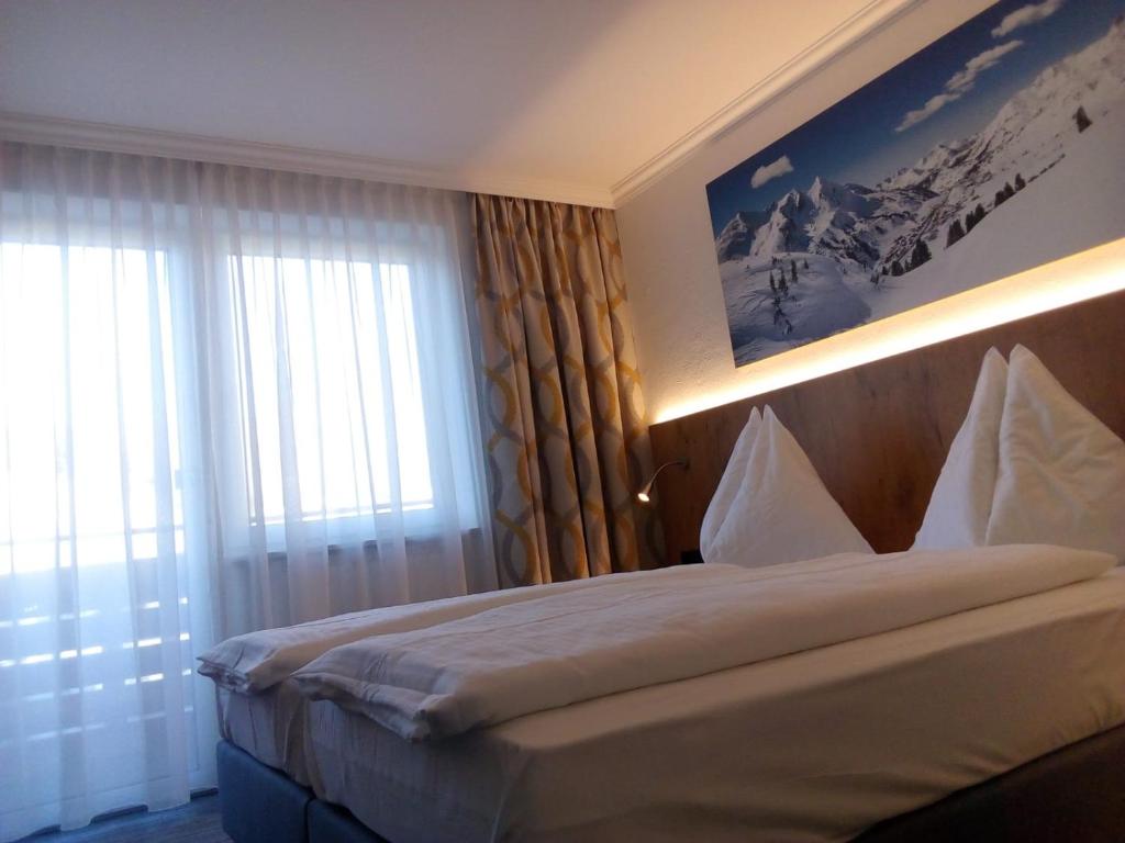 Postel nebo postele na pokoji v ubytování Hotel Wagner