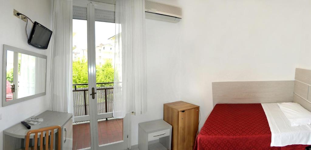 Postel nebo postele na pokoji v ubytování Hotel Zenith